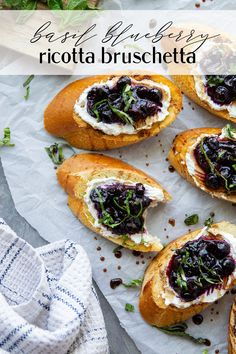 crostini with ricotta and blueberry sauce on top