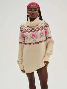 Designed for winter strolls, the Ski Lodge cream sweater exudes a sweet nostalgic mood. Crafted in a cashmere blend, this oversized sweater spotlights a turtleneck, rib trims, and whimsical floral patterns. Wear it as a dress or over your favorite vintage jeans. Ski Lodge, Wedding Lingerie, Cream Sweater, Kids Sweater, Outerwear Sweater, Oversized Sweater, Floral Patterns, Vintage Jeans, Denim Top