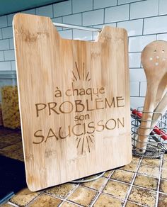 a wooden sign that says a chapee problem son saucsson on it