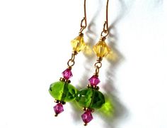 Long dangle colorful earrings, glass crystal bead link earrings, green fuchsia yellow, Gold plated, Glass Faceted Beads Earrings For Gift, Glass Earrings With Faceted Beads For Gift, Glass Earrings With Faceted Beads As A Gift, Glass Dangle Jewelry With Faceted Beads, Green Czech Glass Earrings With Colorful Beads, Czech Glass Faceted Bead Drop Earrings, Czech Glass Dangle Jewelry With Faceted Beads, Yellow Czech Glass Jewelry With Faceted Beads, Topaz Yellow