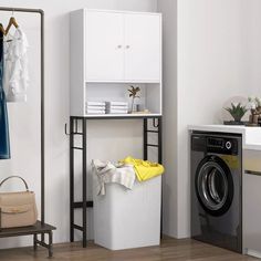 a washer and dryer are next to each other in a room with white walls