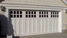 an image of a garage with white doors