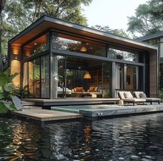 a floating house in the middle of a pond with lounge chairs and tables around it