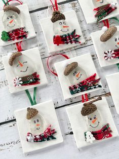 snowman ornaments made out of napkins on a table