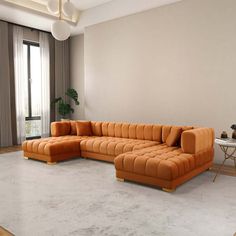 an orange sectional couch in a living room