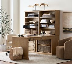 a living room filled with furniture and a book shelf on top of a wooden table