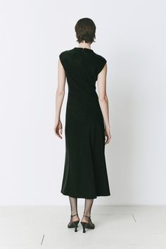 Black midi dress with a mock neck and silky finish. True-to-size fit, blending modern style and effortless fall sophistication. Formal Fall High Neck Midi Dress, Formal High-neck Midi Dress For Fall, Formal High Neck Midi Dress For Fall, Elegant Solid Color Turtleneck Dress, Elegant Solid Turtleneck Dress, Elegant Turtleneck Dress, Elegant High Neck Midi Dress For Fall, Spring Evening Turtleneck Midi Dress, Chic Formal Turtleneck Dresses