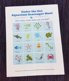 the under the sea aquarium scavenger hunt is shown on top of a table