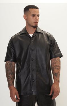 Short Sleeve Leather Shirt Jacket - Black - Ron Tomson Luxury Black Shirt For Spring, Classic Black Single Breasted Top, Classic Black Single-breasted Top, Casual Black Leather Jacket With Lapel Collar, Luxury Black Button-up Top, Black Luxury Button-up Top, Luxury Black Tops With Button Closure, Black Leather Button-up Top, Black Business Outerwear With Spread Collar