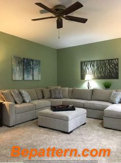 a living room filled with furniture and a ceiling fan in the middle of the room