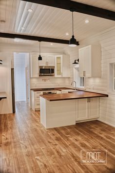 the kitchen is clean and ready for us to use in its new owner's home