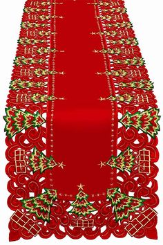 a red table runner with christmas decorations on it