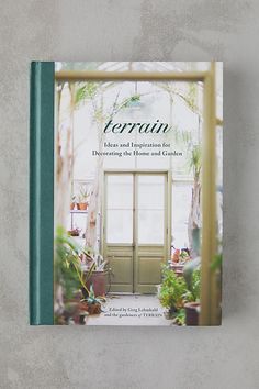 a book on the cover of terrain