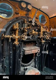 an old steam engine with gauges and valves