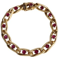 CHAUMET Bracelet in 18 Carat yellow Gold and 13 Ruby Jewels in the Center of each Link set with a Claw. Signed CHAUMET and numbered 7068C. Tab Clasp with Eight Security. Gross weight: 31.9 g Length: 18 cm Width: 0.8 cm Chaumet Bracelet, Ruby Jewel, Ruby Bracelet, Antique Diamond, Vintage Designer, Diamond Gemstone, Link Bracelets, Shanghai, Diamond Jewelry