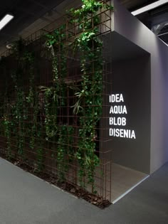 a wall with plants growing on it and the words idea aqua blob disena