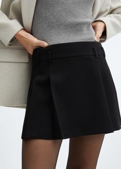 Pleated mini-skirt -  Women | Mango USA Mini Skirt With Pockets, Black Pleated Skort, Mini Pleated Skirt Outfit, Black Pleated Mini Skirt, Oversized Wool Coat, Mini Skirt, Textured Knit Sweater, Ribbed Knit Dress, Black Mini Skirt