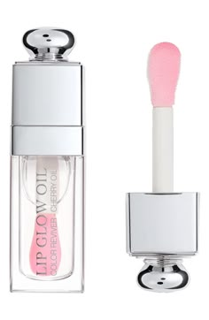 Free shipping and returns on Dior Lip Glow Oil at Nordstrom.com. What it is: A nourishing, glossy lip oil that protects and enhances your lips to bring out their natural color.What it does: Delivering sheer coverage with a shiny finish, this nonsticky, non-greasy, rich and balmy oil combines the mirror shine of a lip gloss with the comfort of intense lip care. Enriched with cherry oil, its pampering formula creates protection against stress factors and Oil Texture, Lip Glow Oil, Makeup Favorites, Dior Lip, Dior Addict Lip Glow, Dior Lip Glow, Glow Oil, Dior Addict Lip, Fotografi Vintage