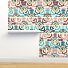 an abstract wallpaper design with multicolored rainbows on the walls and floor