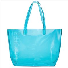 St. Tropez Transparent Blue Tote Bag. Approximately 18”X11.5”. Brand New, Never Used. Trendy Blue Beach Bag With Large Capacity, Blue Shoulder Bag For Shopping With Dust Bag, Trendy Blue Shopping Bags, Trendy Blue Shopping Bag, Large Capacity Blue Bags For Errands, Blue Beach Shoulder Bag For Shopping, Blue Shoulder Beach Bag, Blue Satchel Beach Bag For Travel, Trendy Blue Tote Beach Bag