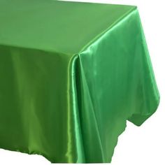 a plain green table cloth on a white background