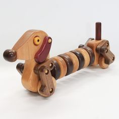 a wooden toy that looks like a dog