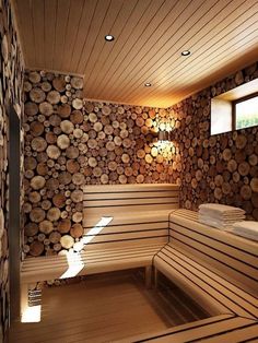 a wooden sauna with logs stacked on the wall