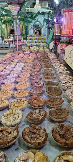 many pies and pastries are on display