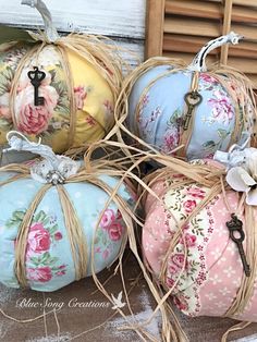 four decorative pumpkins sitting on top of each other