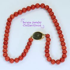 Simple and elegant Sardinia coral bead necklace with an 18k yellow gold clasp! Total Weight: 45.86 grams Necklace Length: 17 inch 18k gold clasp: 18.8mm x 13.7mm Precious Metal: 18k gold Precious stones: -Coral Round Beads: 8.1mm to 9mm diameter -Coral Faceted Oval: 12..3mm x 8.5mm Formal Coral Single Strand Beaded Necklace, Elegant Single Strand Red Coral Necklaces, Elegant Single Strand Red Coral Necklace, Elegant Red Coral Round Bead Necklace, Elegant Red Coral Round Bead Necklaces, Luxury Red Coral Necklaces, Luxury Single Strand Round Beaded Necklace, Luxury Red Coral Necklace, Formal Single Strand Red Coral Necklace