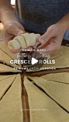 a person is making some bread on a table