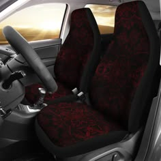 red and black car seat covers with an intricate design