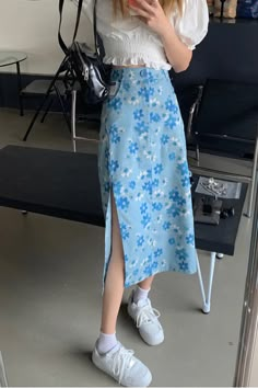 High Waist Blue Floral Split Jeans Skirt – Tomscloth Blue Floral Outfit, Trending Skirt Outfits, Blue Long Skirt For Spring, Blue Flower Skirt Outfit, Flower Skirts, Trendy Blue Skirt With Pockets, Trendy High Waist Light Blue Skirt, Casual High Waist Light Blue Skirt, Blue Mini Skirt With Pockets For Spring