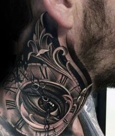 a man's neck with a clock tattoo on it