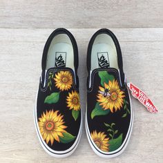 BLACK SUNFLOWER and BEE slip on sneaker. All Items are 100% hand painted with paint brush,no paint pen. They are water-proof, permanent and no fading. You can also change the color, enter the name or customize whatever design you like on shoes. Just send us a message. It is perfect gift for your friend or lover. Suggest hand washed with soft brush. If your order is Vans please check the true size from your nearest Shop. Kids shoe is available and if you don't see you size please message me for m Sunflower Shoes, Disney Painted Shoes, Shoe Art Designs, Canvas Shoes Diy, Woman Friends, Sunflower And Bee, Sunflower Vans, Bee Shoes