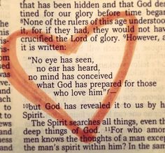 an open book with a heart drawn on it and the words god has revealed in red