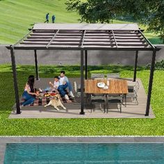 two people sitting at a table with a dog in front of them near a pool