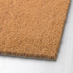 a close up view of a brown carpet