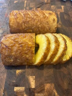 sliced pineapple and banana bread on a cutting board