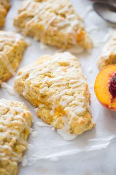 peach scones with white glaze and fresh fruit