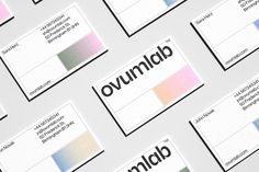 several business cards with different colors on them