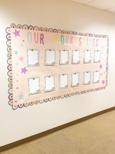 a bulletin board on the wall in an empty room with stars and confetti