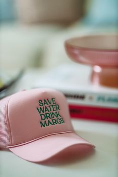 HAZEL & OLIVE Save Water Drink Margs Embroidered Trucker Hat - Pink Trendy Pink Trucker Hat With Curved Visor, Pink Trucker Hat With Embroidered Logo, White Dress Formal, Save Water Drink, Feather Tops, Water Drink, Summer Sundress, Beach Bridal, Top Graphic Tees