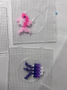 two pieces of plastic beaded artwork on top of each other