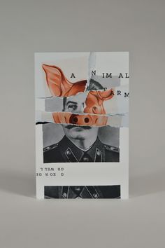 an image of a man's face through torn paper with the words animal farm on it