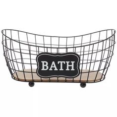 a metal basket with a sign that says bath on it