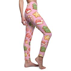 Ginger Bread Christmas Cookies Leggings in Pink Embrace the festive spirit with these adorable Gingerbread Cookies Christmas Leggings! Featuring an all-over pattern of yummy gingerbread cookies, these leggings are sure to spread holiday cheer wherever you go. Made from soft and stretchy fabric, these leggings are comfortable enough to wear all day long. They're perfect for lounging around the house, baking cookies, or attending holiday parties. Whether you're looking for a cozy gift for yourself or a loved one, these gingerbread cookie leggings are sure to be a hit! Details: Made from soft and stretchy fabric Comfortable fit Full-length design All-over print of gingerbread cookies 95% Polyester brushed suede 5% Spandex Tagless White thread color Runs true to size  Assembled in the USA from Ginger Bread Christmas, Gingerbread Cookies Christmas, Gingerbread Christmas Cookies, Bread Christmas, Cookies Christmas, Baking Cookies, Gingerbread Cookie, Christmas Leggings, Gingerbread Christmas