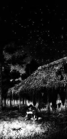 a black and white photo of a hut at night