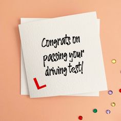 a piece of paper with the words congrats on passing your driving test written on it