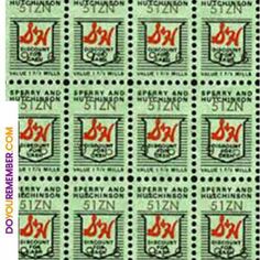 stamps with red and black numbers on them, all in different colors are shown against a green background